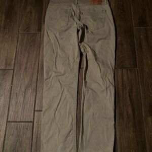 Tan Levi's 514 straight leg jeans